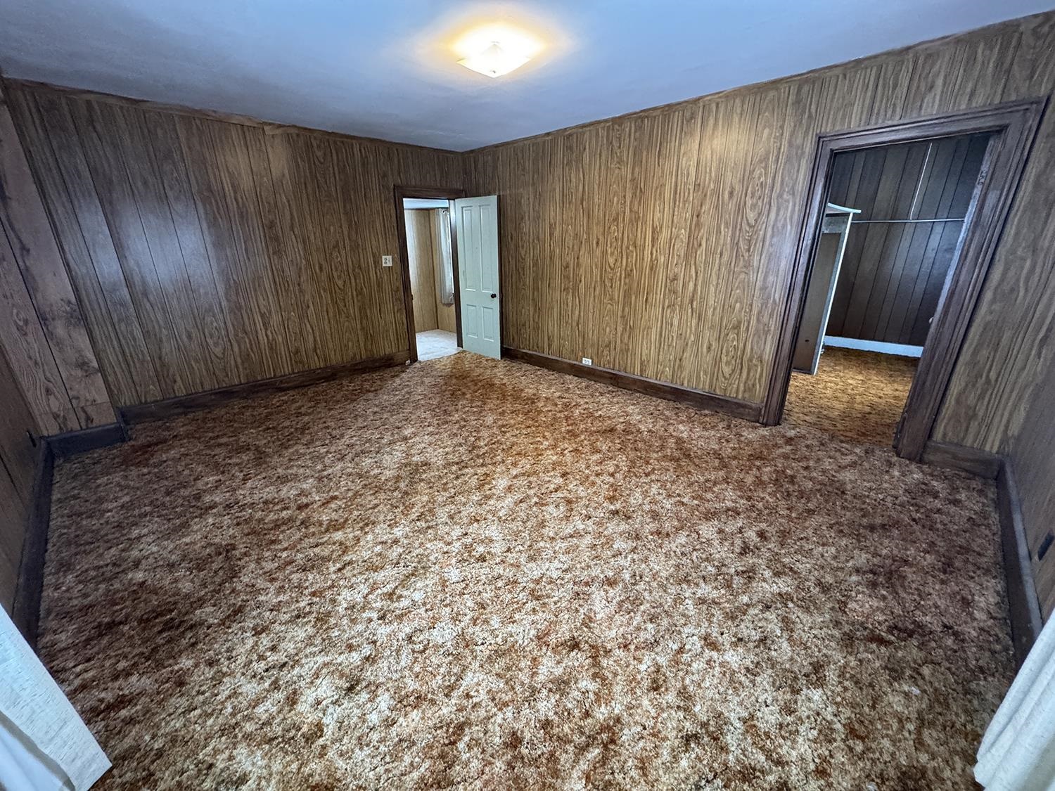 18341 Pleasant Hill Road Mount Carroll, IL 61053 - Photo 35 of 41 a view of an empty room with wooden door