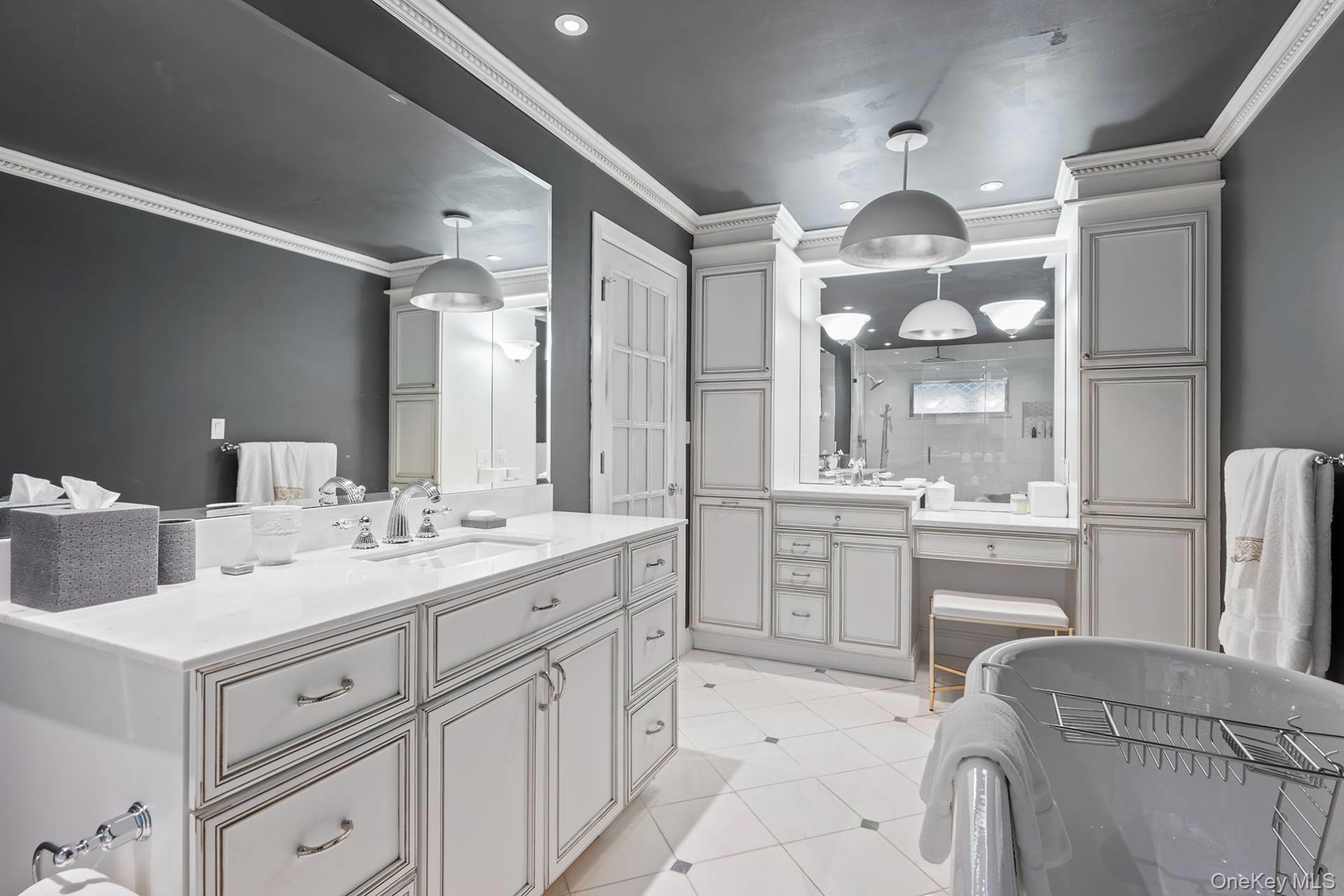 1824 Majors Path Southampton, NY 11968 - Photo 21 of 28 Bathroom featuring vanity, a stall shower, ornamental molding, recessed lighting, and light tile patterned flooring