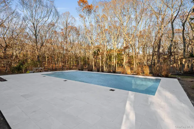 a view of wooden fence and trees