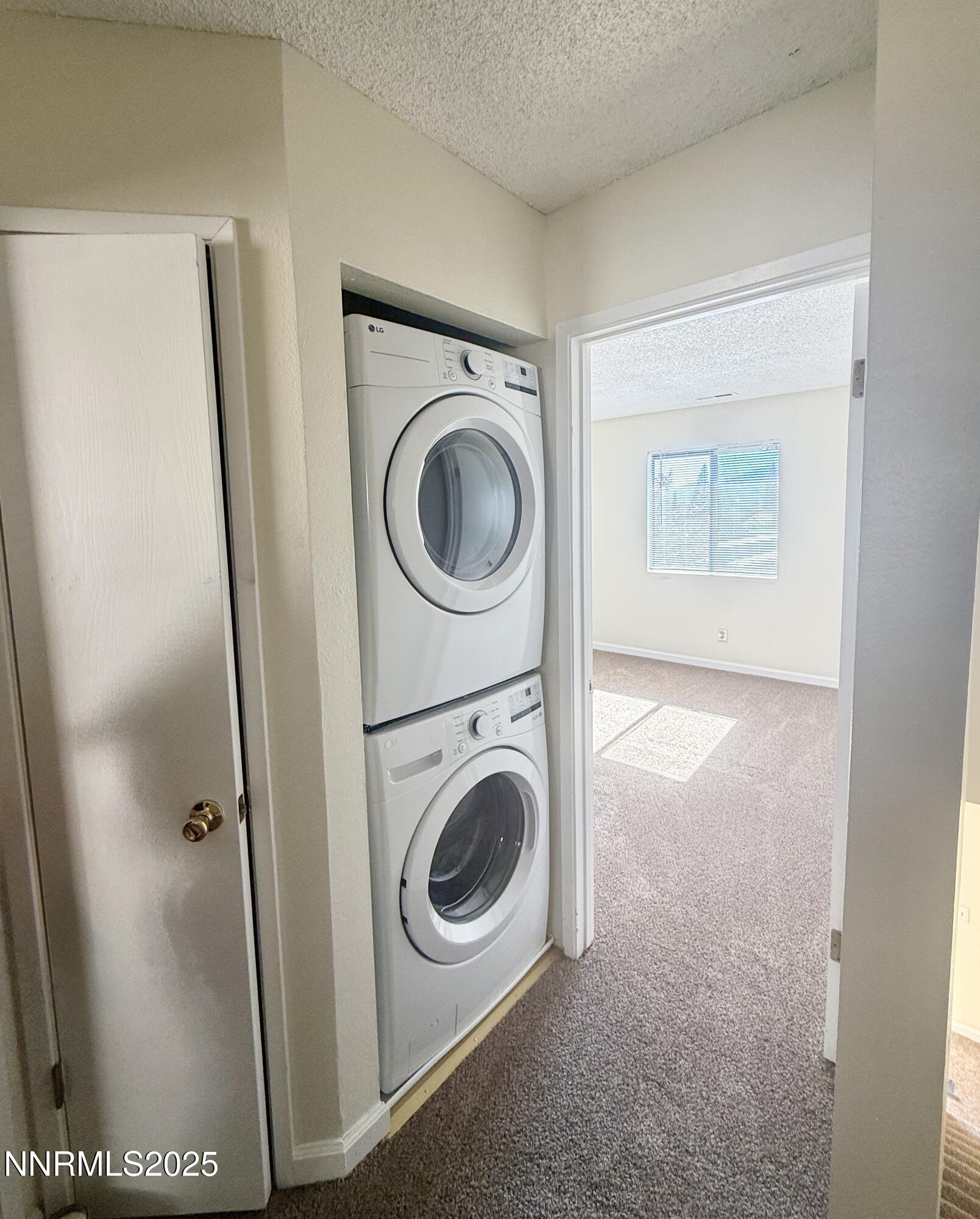 4985 West 7th Street, Unit 16 Reno, NV 89503 - Photo 9 of 10 a utility room with dryer and washer