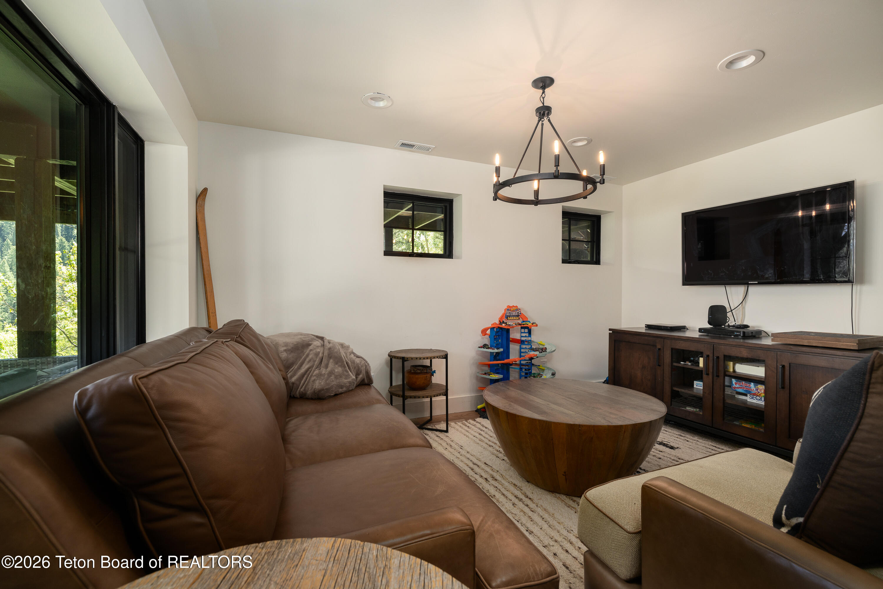 6900 Paintbrush Trail Wilson, WY 83014 - Photo 22 of 47 Basement Living Room