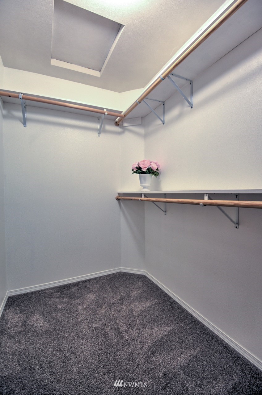1308 Golf Club Road Southeast Lacey, WA 98503 - Photo 13 of 23 a view of a room with rack on the wall