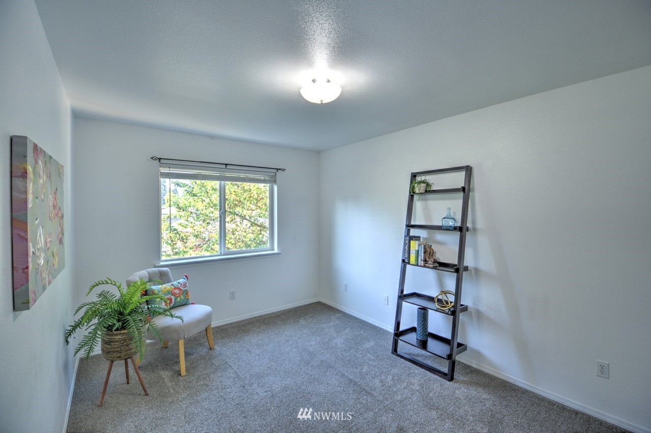 1308 Golf Club Road Southeast Lacey, WA 98503 - Photo 16 of 23 a view of a workspace with furniture and a window