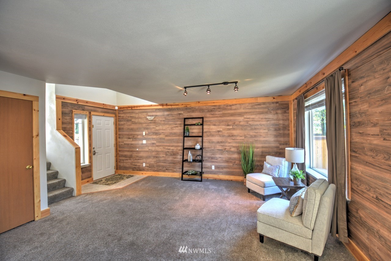 1308 Golf Club Road Southeast Lacey, WA 98503 - Photo 2 of 23 a view of a livingroom with furniture and a window