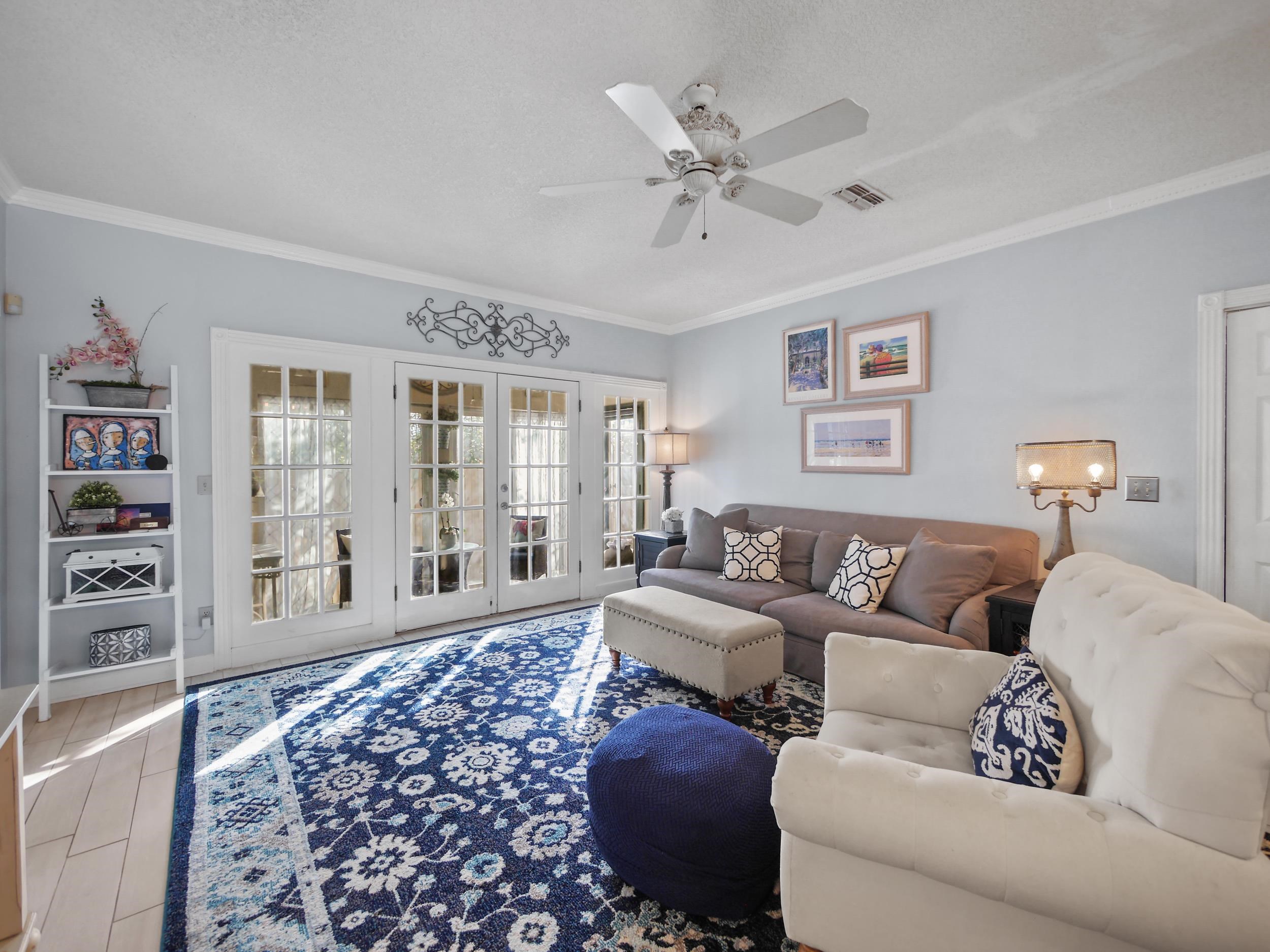 84 Seascape Circle St. Augustine, FL 32080 - Photo 14 of 34 a living room with furniture and a large window