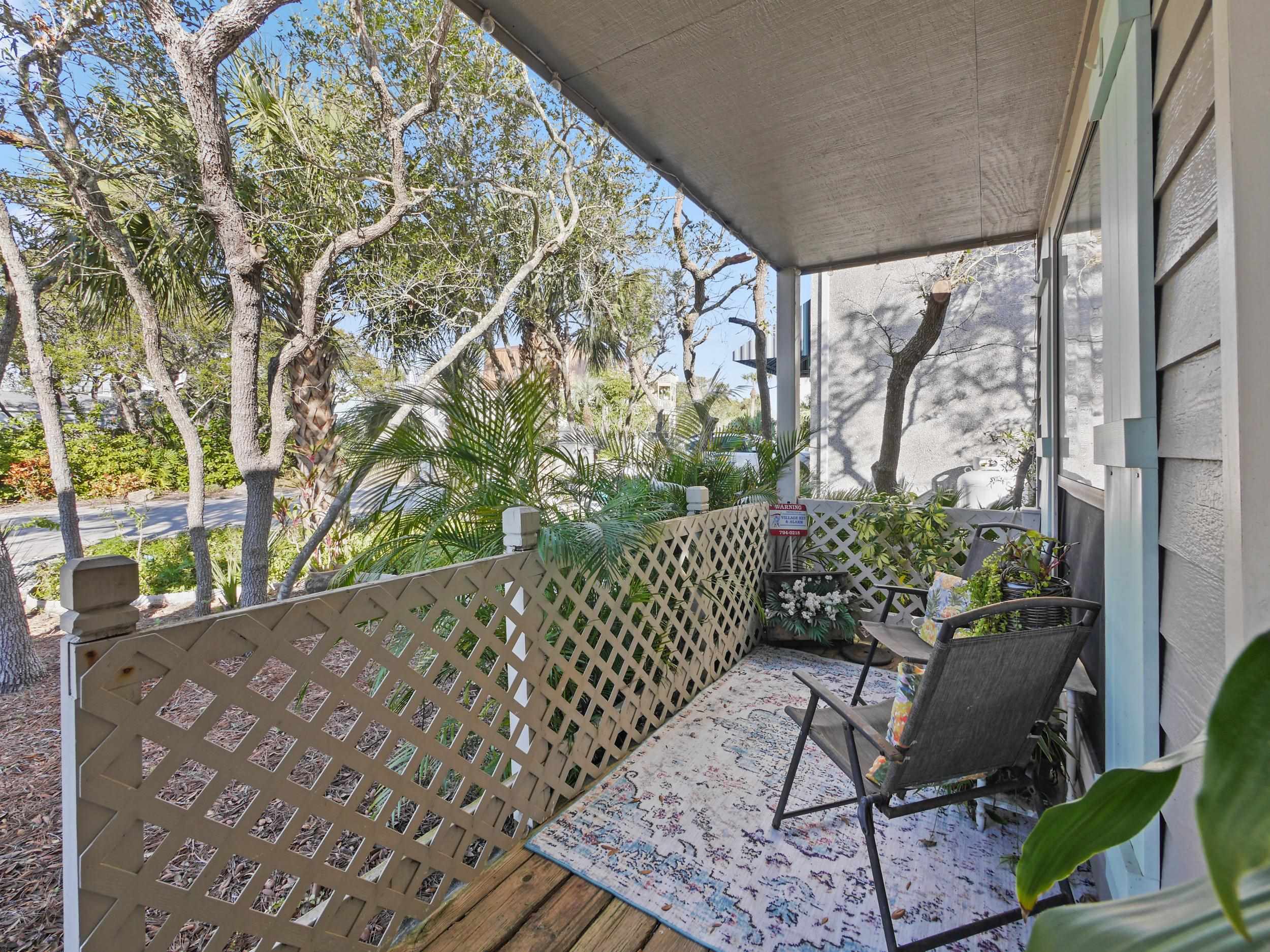 84 Seascape Circle St. Augustine, FL 32080 - Photo 28 of 34 a wooden bench sitting in front of a building
