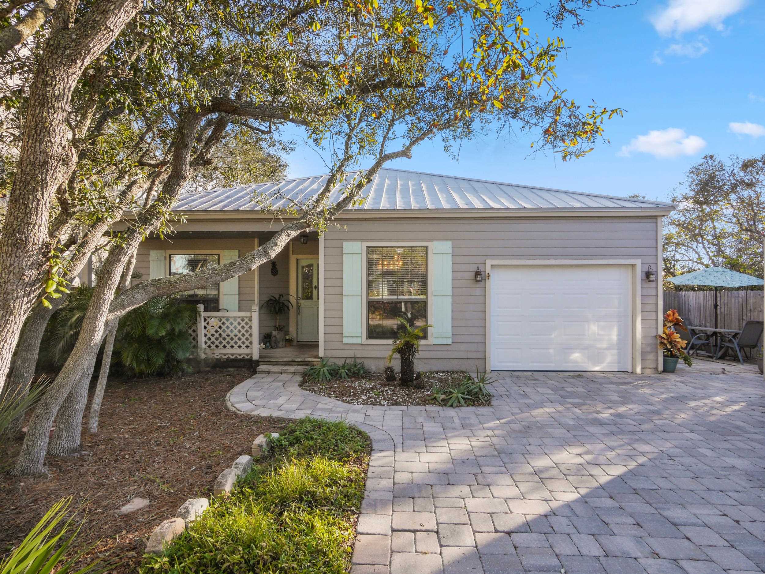 84 Seascape Circle St. Augustine, FL 32080 - Photo 30 of 34 a front view of a house with garden