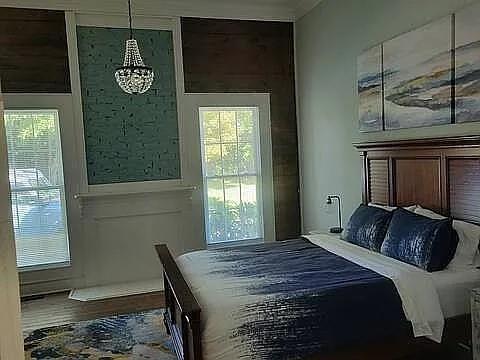 151 South Jackson Street Hartwell, GA 30643 - Photo 11 of 17 a bedroom with a bed and a window