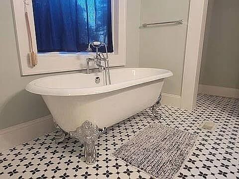 151 South Jackson Street Hartwell, GA 30643 - Photo 13 of 17 a bathroom with a sink and a mirror