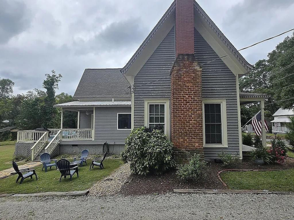 151 South Jackson Street Hartwell, GA 30643 - Photo 16 of 17 a view of a house with backyard