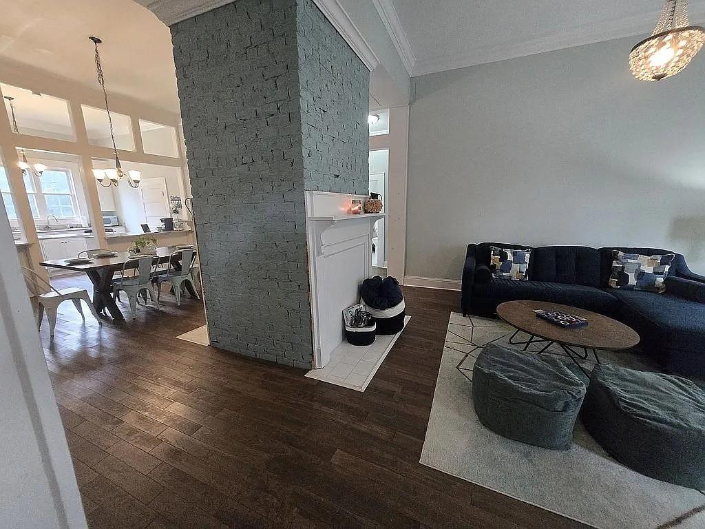 151 South Jackson Street Hartwell, GA 30643 - Photo 3 of 17 a bedroom with furniture and a wooden floor