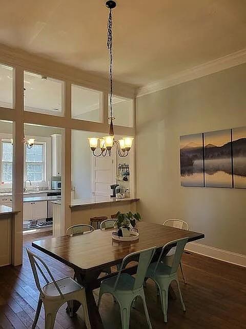 151 South Jackson Street Hartwell, GA 30643 - Photo 5 of 17 a view of a dining room with furniture window and wooden floor