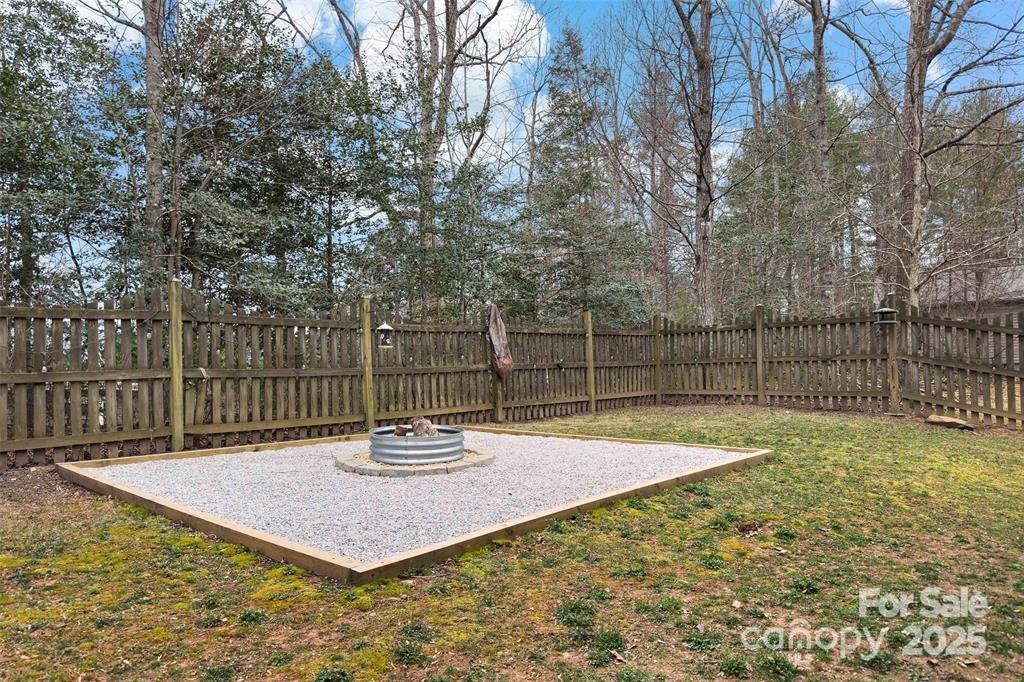 2691 Laurel Point Drive Nebo, NC 28761 - Photo 38 of 44 a view of a backyard with wooden fence