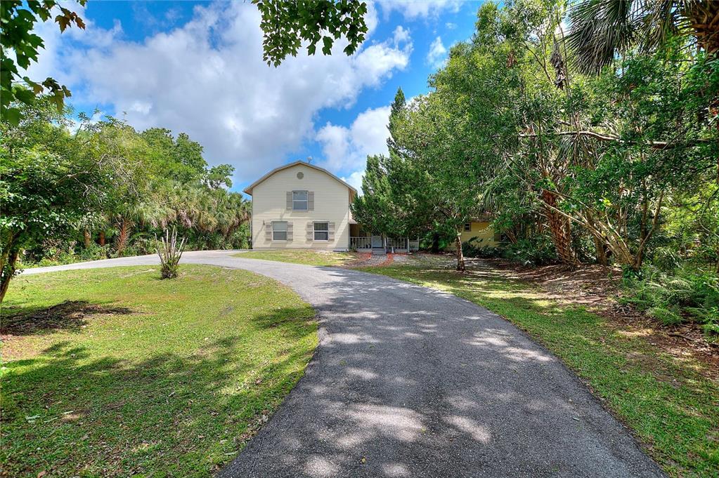 3641 Turtle Mound Road Melbourne, FL 32934 - Photo 53 of 77 a swimming pool view with a outdoor space