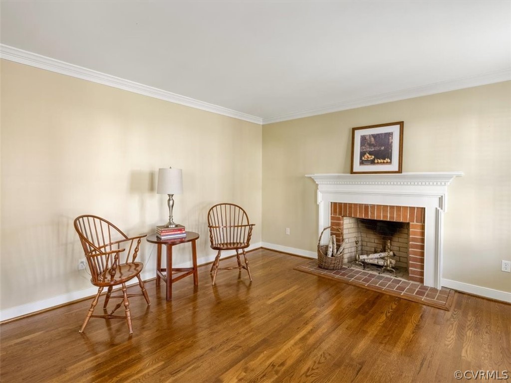 513 Greene Ridge Road Henrico, VA 23229 - Photo 7 of 36 Living Room at front of home has one of 2 fireplaces and crown moulding.