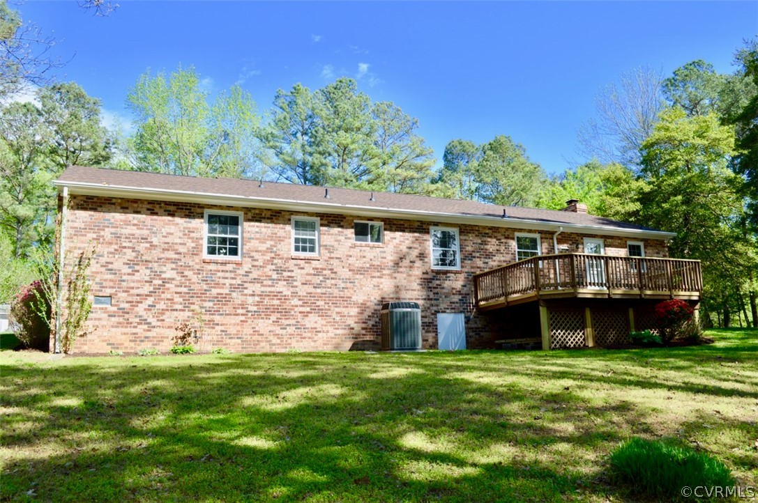 7442 Drexelbrook Road Chesterfield, VA 23832 - Photo 23 of 24 a front view of a house with a garden