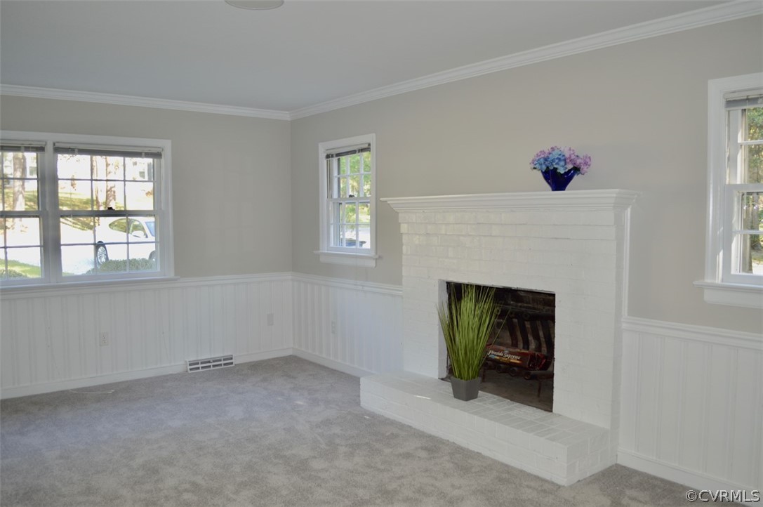 7442 Drexelbrook Road Chesterfield, VA 23832 - Photo 6 of 24 a view of an empty room with a fireplace and a window