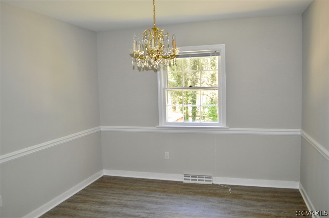 7442 Drexelbrook Road Chesterfield, VA 23832 - Photo 7 of 24 a view of a room with window and chandelier