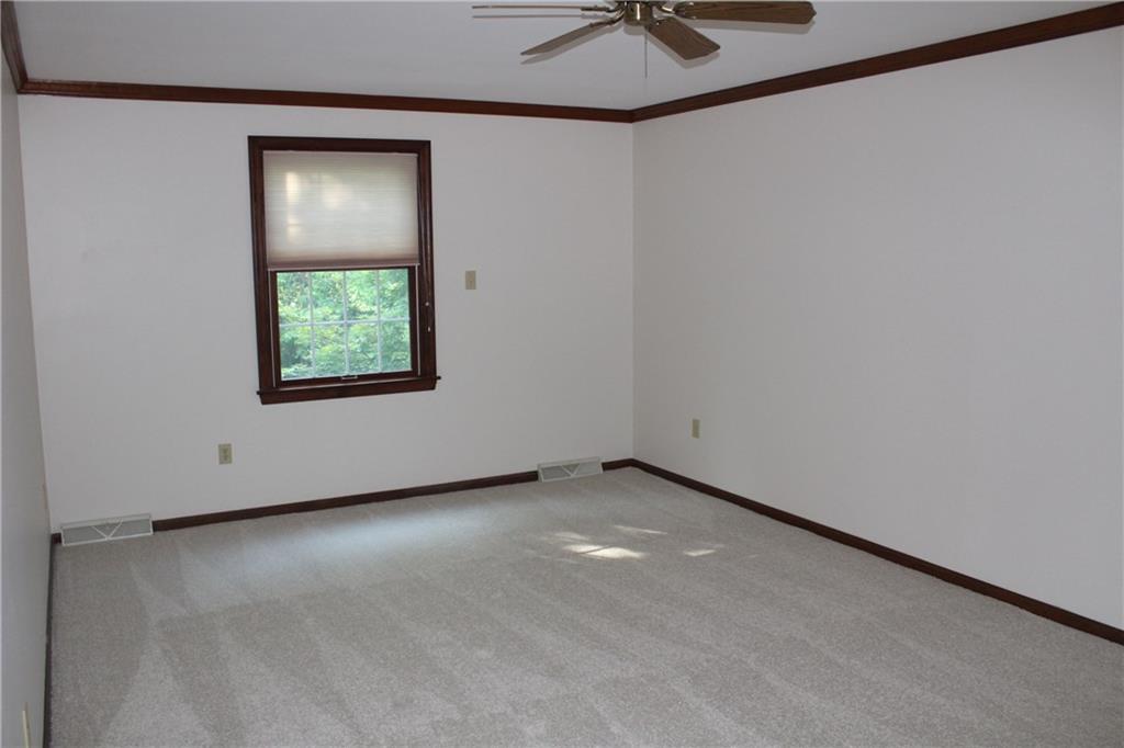 1668 Little Meadow Road Pittsburgh, PA 15241 - Photo 14 of 25 Spacious Master Bedroom with new carpeting and freshly painted.
