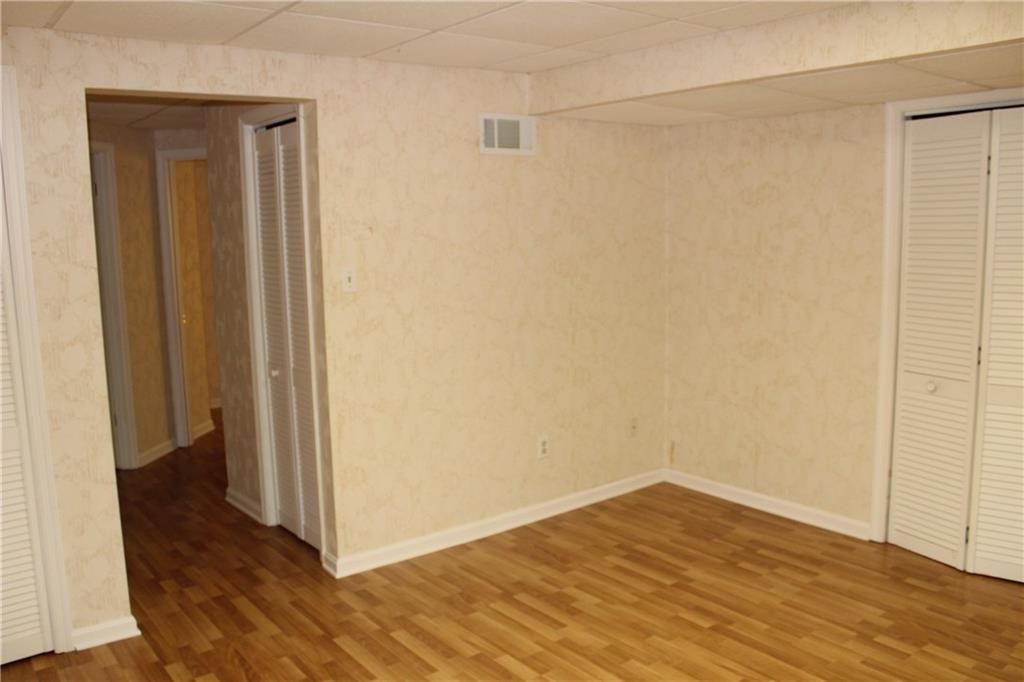 1668 Little Meadow Road Pittsburgh, PA 15241 - Photo 21 of 25 Lower level gameroom could be guest room with closet and full bath off the hallway.