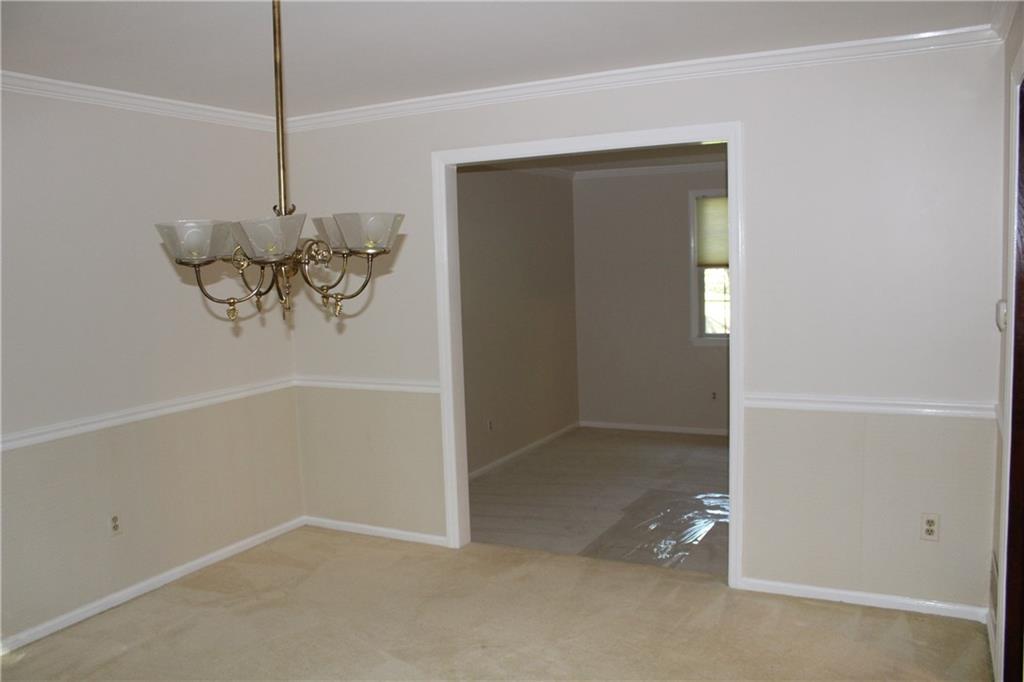 1668 Little Meadow Road Pittsburgh, PA 15241 - Photo 5 of 25 Host holidays in the dining room that features crown molding and chair rail.
