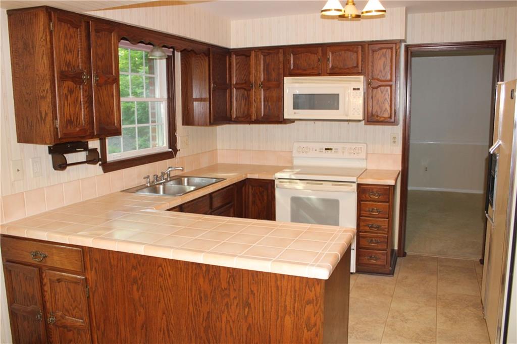 1668 Little Meadow Road Pittsburgh, PA 15241 - Photo 6 of 25 Plenty of storage in the kitchen.