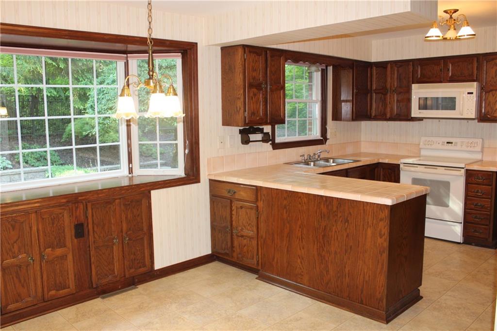 1668 Little Meadow Road Pittsburgh, PA 15241 - Photo 7 of 25 Room for a kitchen table with bow window that overlooks the rear patio.