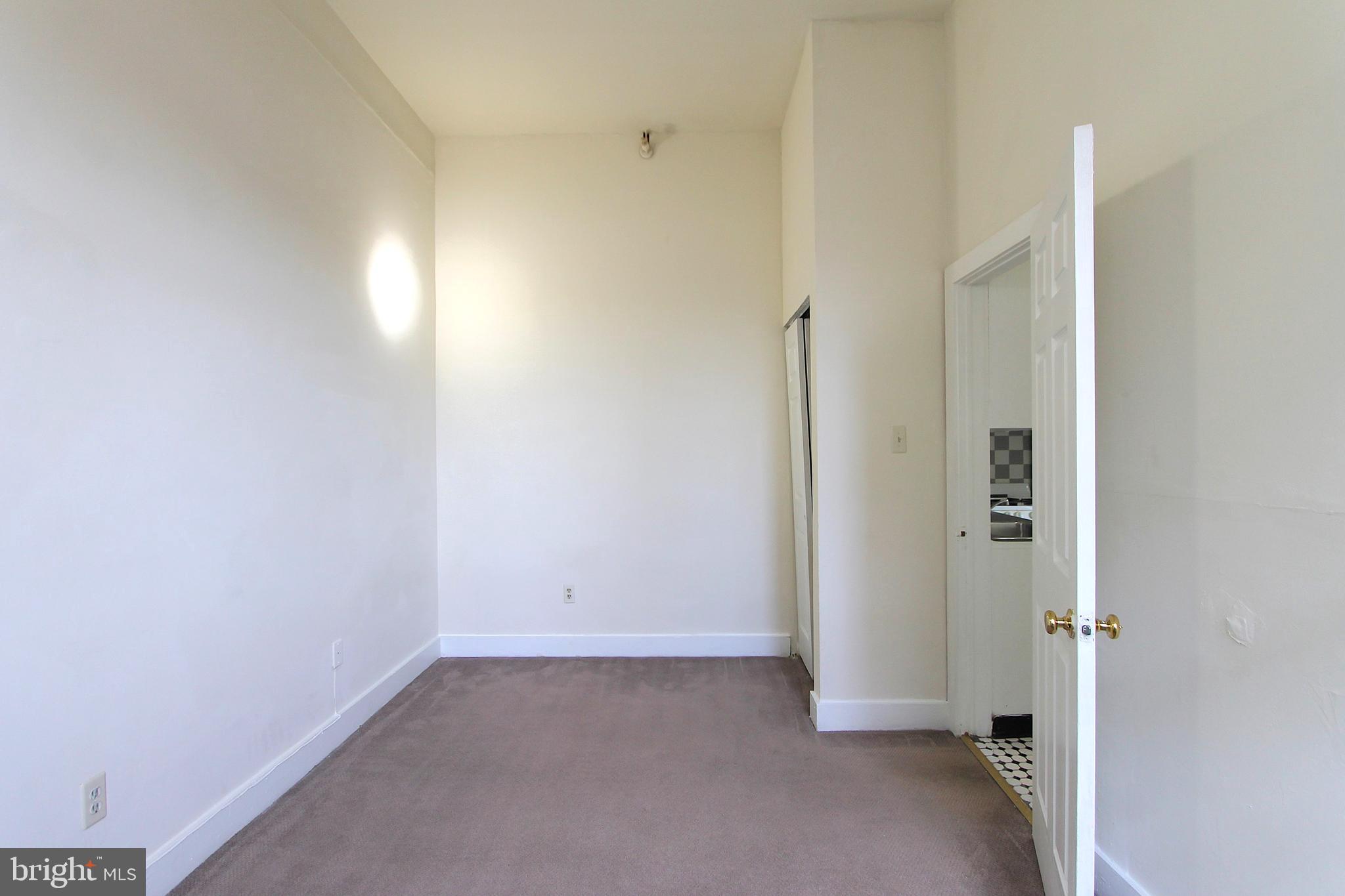 100 East Price Street, Unit 1G Philadelphia, PA 19144 - Photo 13 of 16 a view of an empty room