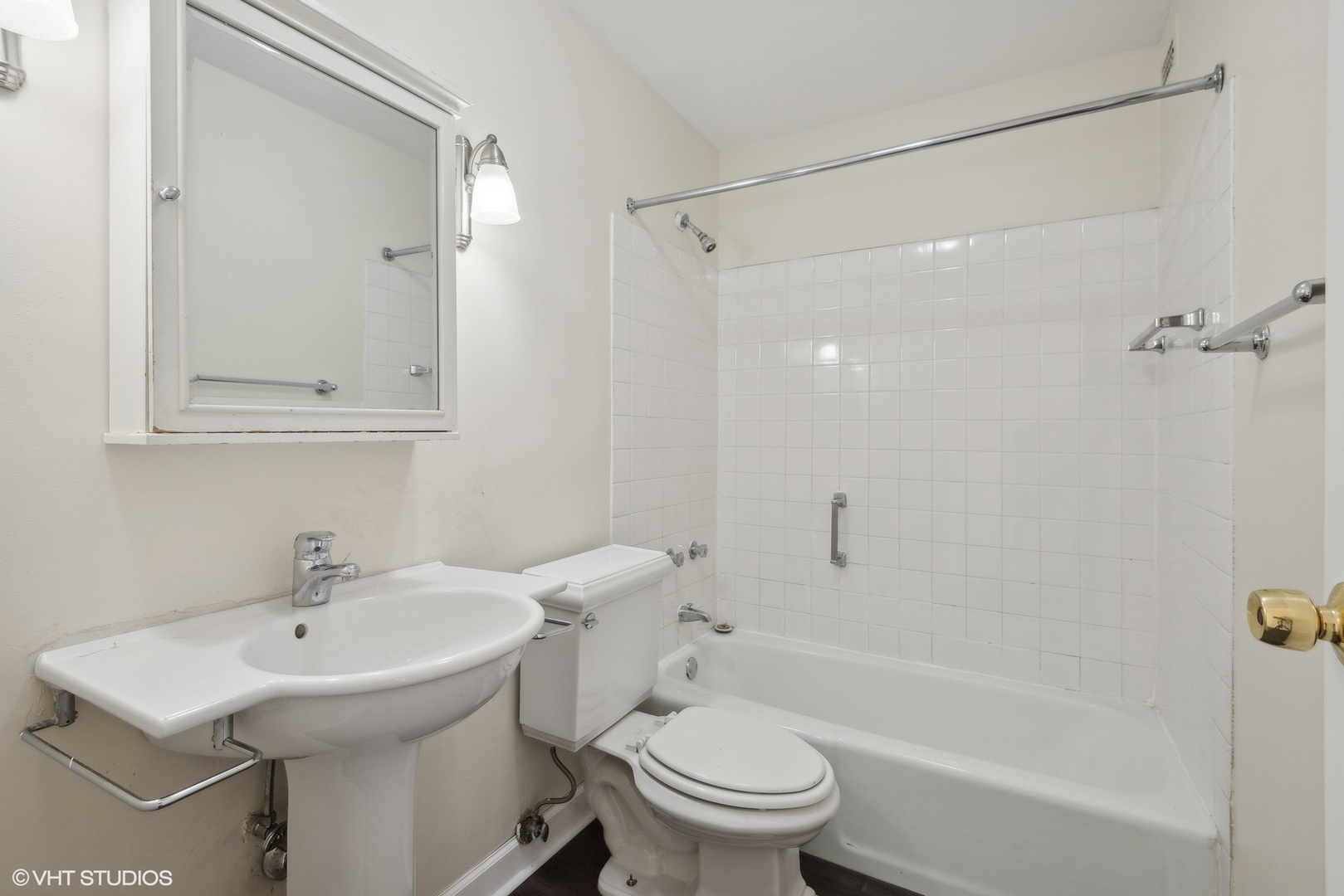 5445 North Sheridan Road, Unit 3812 Chicago, IL 60640 - Photo 16 of 21 a bathroom with a sink toilet and shower