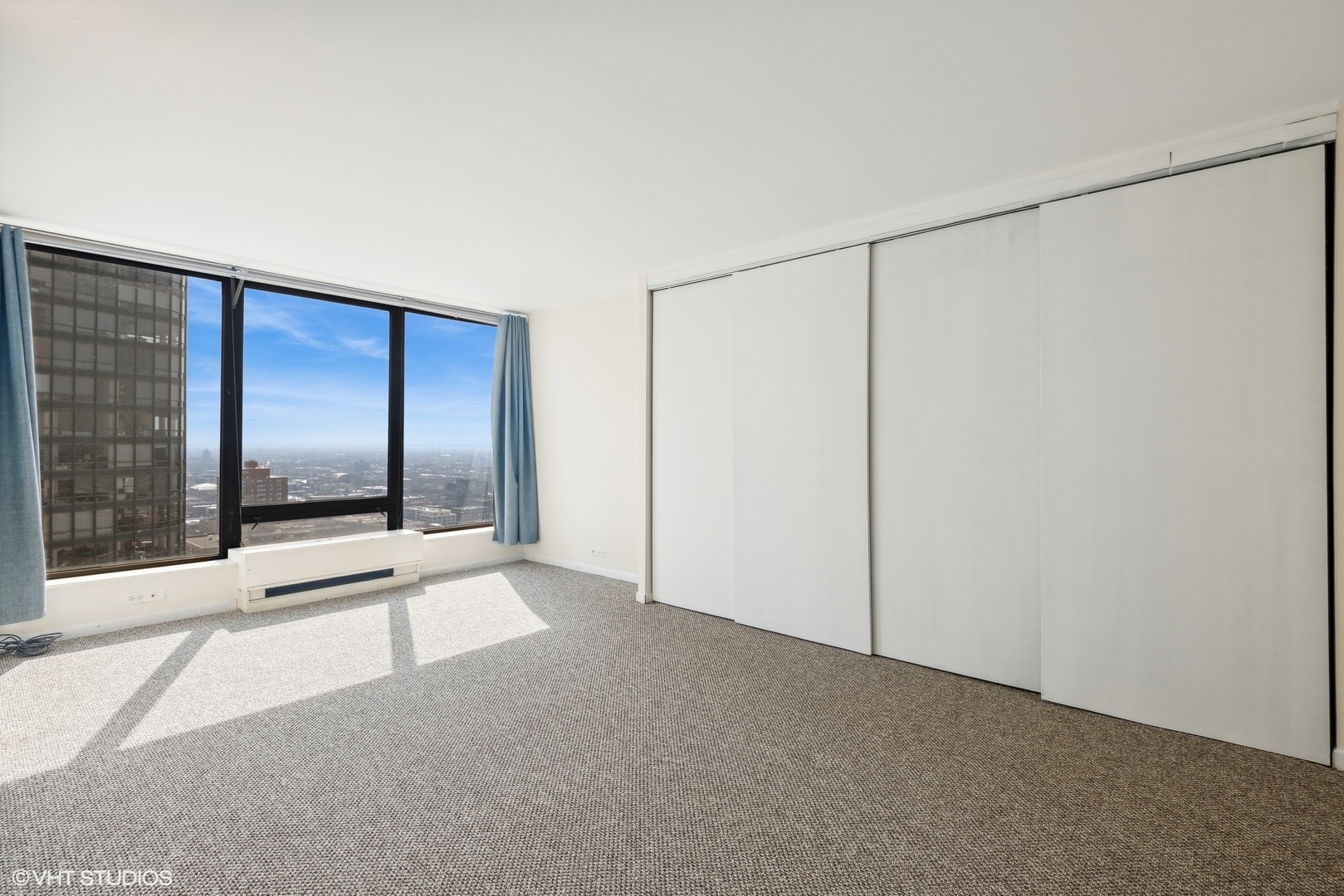 5445 North Sheridan Road, Unit 3812 Chicago, IL 60640 - Photo 17 of 21 a view of a room with an empty space