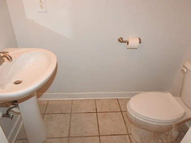 a bathroom with a sink and a toilet