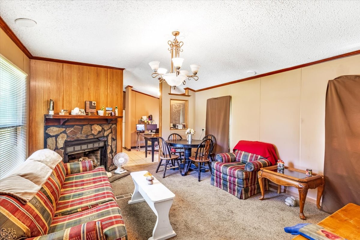 0 Ez Lane Manchester, TN 37355 - Photo 14 of 56 a living room with patio furniture and a chandelier