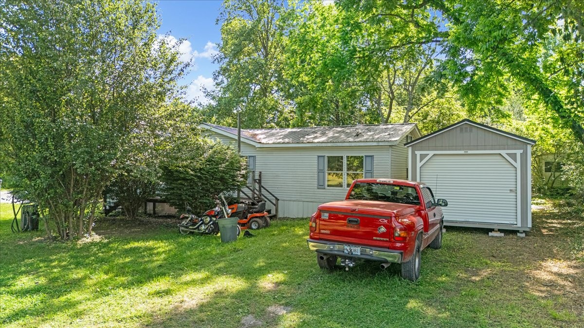 0 Ez Lane Manchester, TN 37355 - Photo 26 of 56 a front view of a house with garden