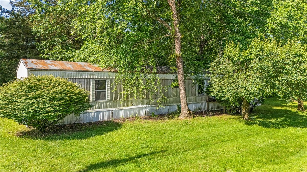 0 Ez Lane Manchester, TN 37355 - Photo 28 of 56 a front view of a house with a yard