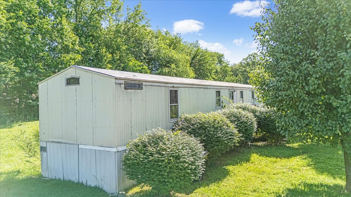 0 Ez Lane Manchester, TN 37355 - Photo 43 of 56 a backyard of a house with lots of green space