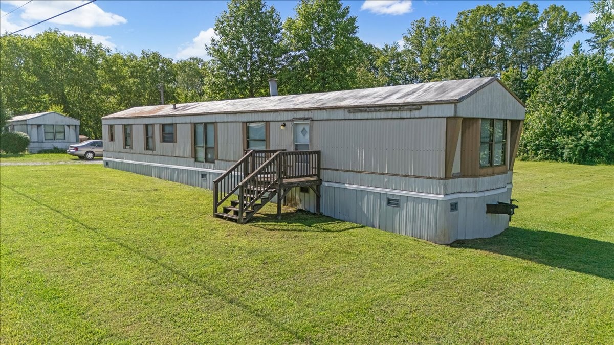 0 Ez Lane Manchester, TN 37355 - Photo 47 of 56 a view of a house with backyard and sitting area