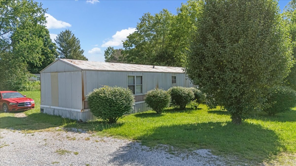 0 Ez Lane Manchester, TN 37355 - Photo 49 of 56 a view of a house with backyard and garden