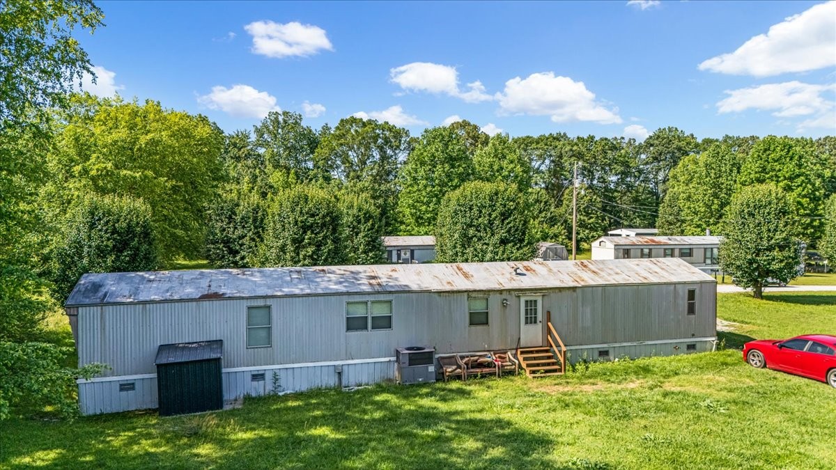 0 Ez Lane Manchester, TN 37355 - Photo 50 of 56 an aerial view of a house with garden space and street view