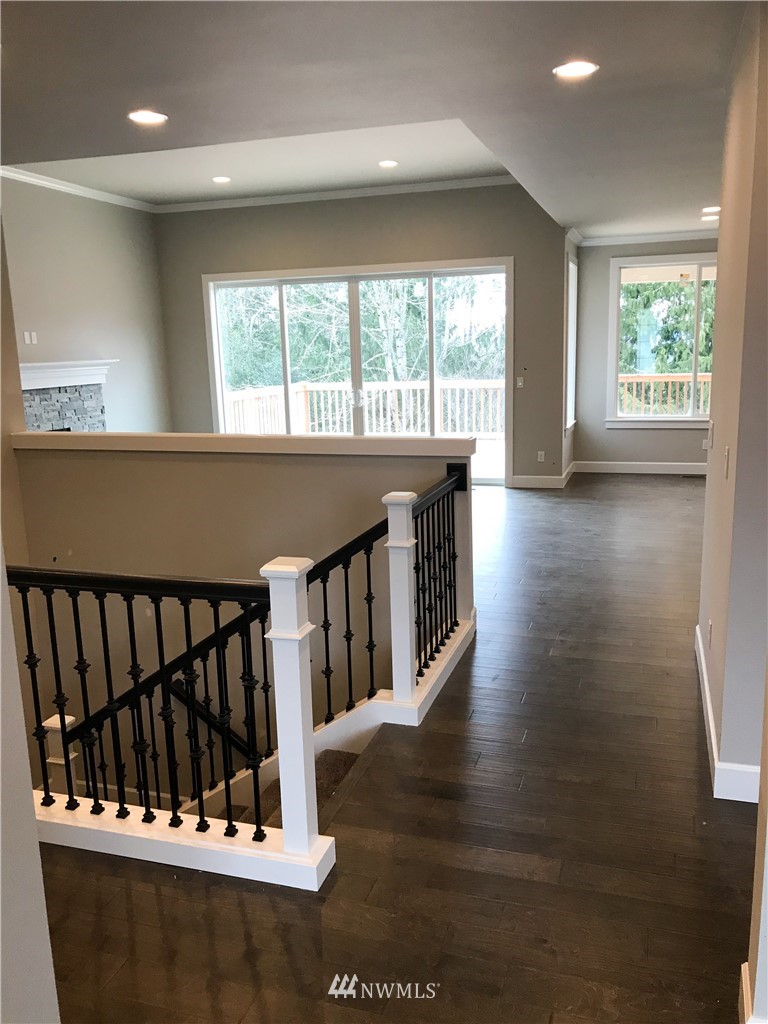 1670 Spaulding Circle Buckley, WA 98321 - Photo 3 of 22 a view of a porch with wooden floor