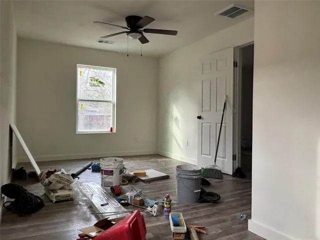 an aerial view of a play house with a yard