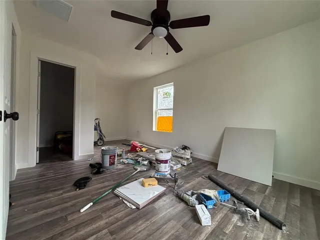 a bed room with furniture and a window