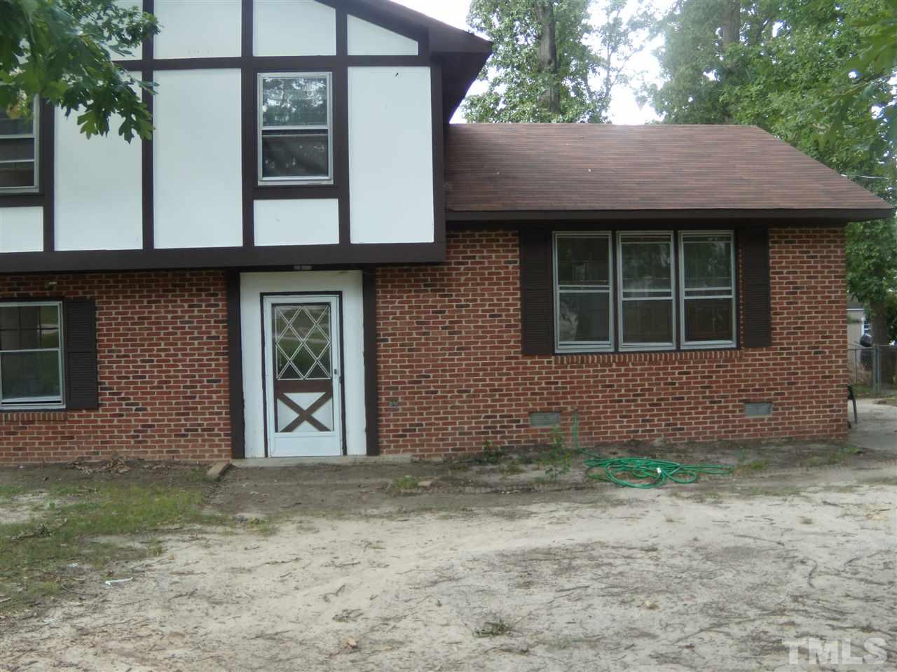 4201 Live Oak Road Raleigh, NC 27604 - Photo 14 of 17 a front view of a house with garden