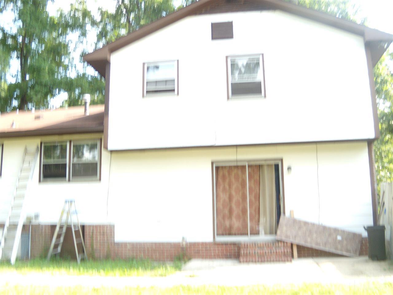 4201 Live Oak Road Raleigh, NC 27604 - Photo 17 of 17 a view of a house with backyard and sitting area