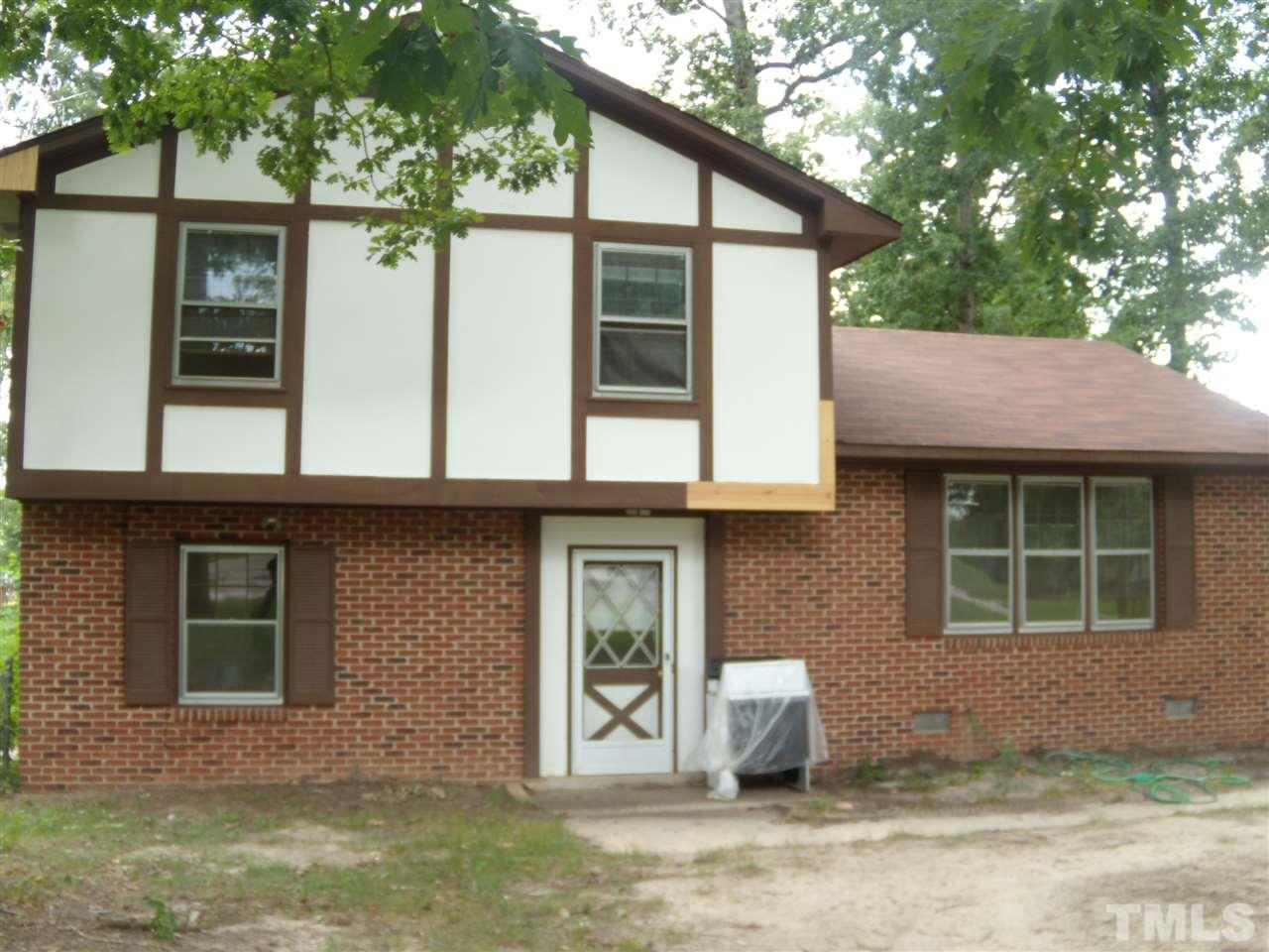 4201 Live Oak Road Raleigh, NC 27604 - Photo 6 of 17 a front view of a house with garden