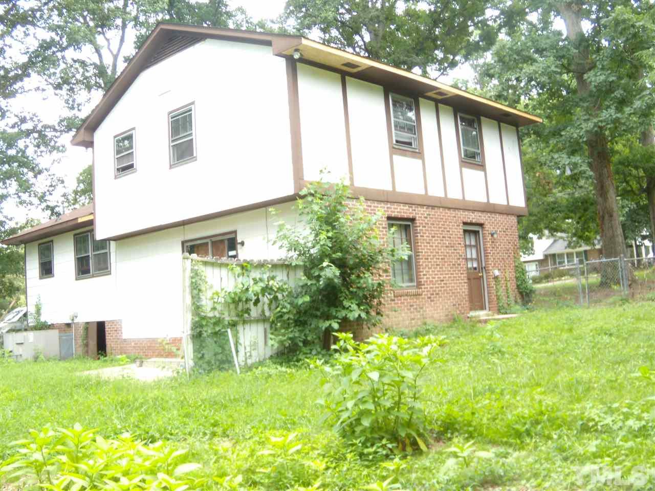 4201 Live Oak Road Raleigh, NC 27604 - Photo 10 of 17 a house that has a lot of plants in it