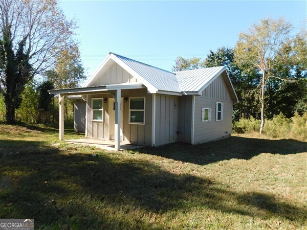 520 Old Athens Drive Nicholson, GA 30565 - Photo 4 of 13 a front view of a house with a yard