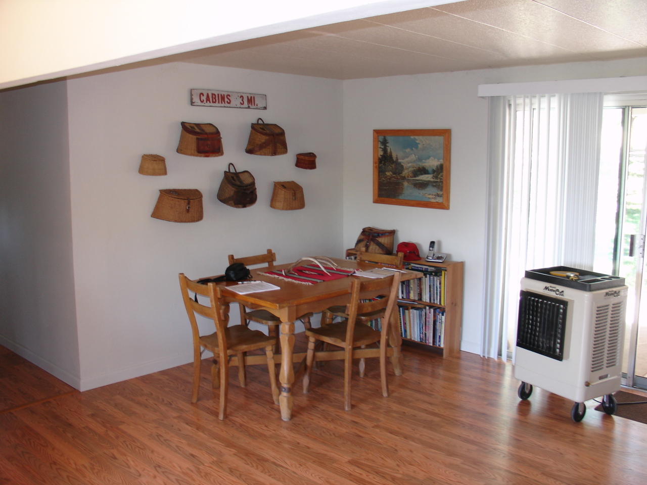 40624 Red Mountain Road Fall River Mills, CA 96028 - Photo 6 of 11 a view of a dining room with furniture and wooden floor