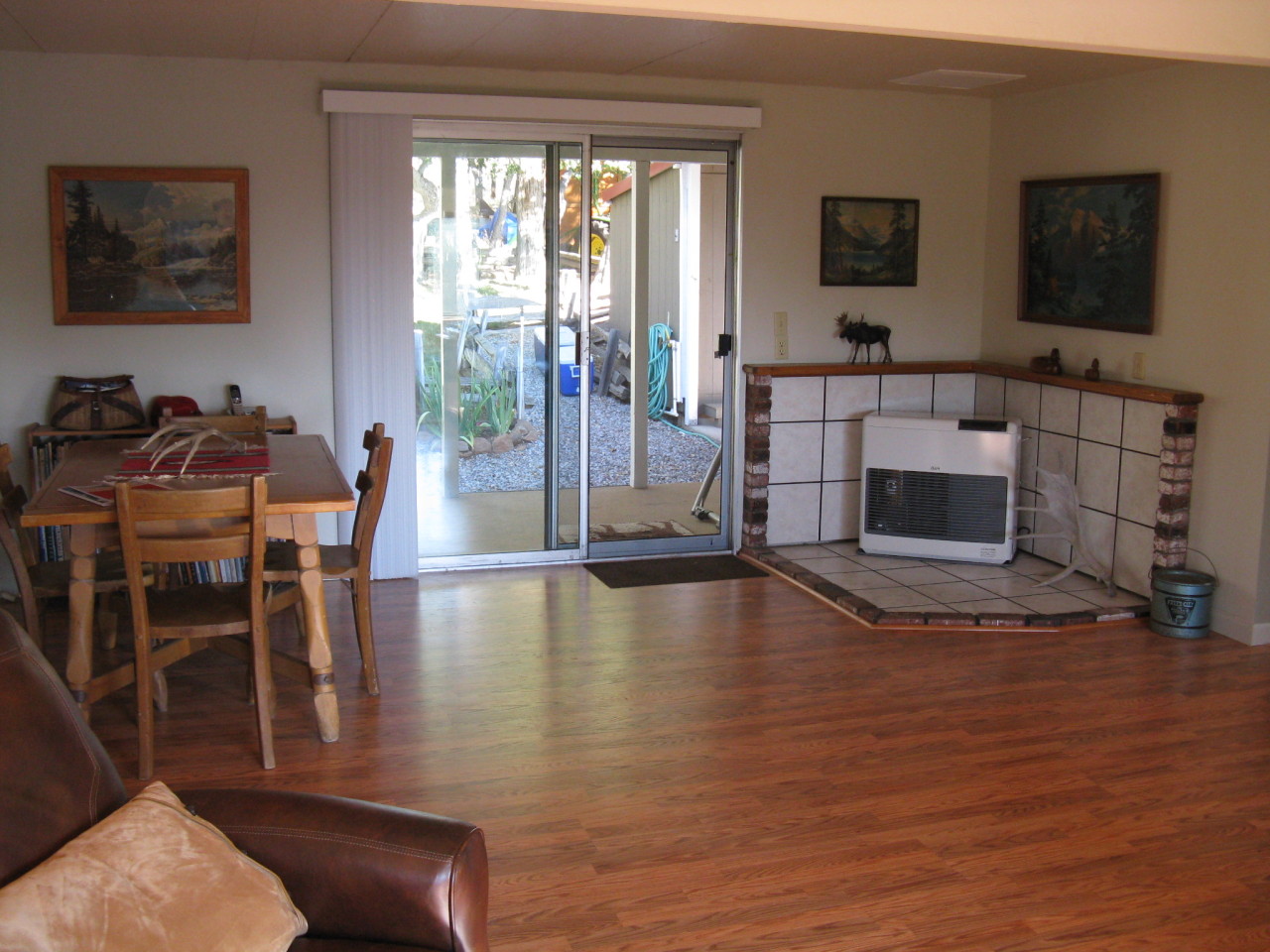 40624 Red Mountain Road Fall River Mills, CA 96028 - Photo 10 of 11 a living room with furniture a flat screen tv and a fireplace