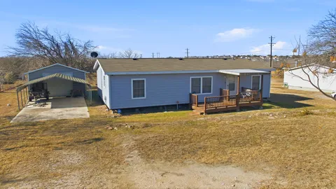 a view of a terrace with chairs