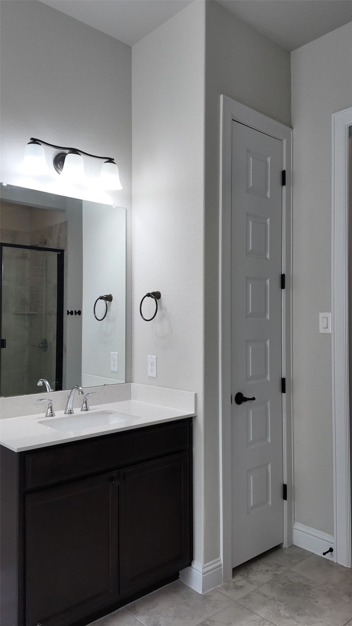 2320 Base Burner Path Leander, TX 78641 - Photo 20 of 24 Modern bath vanity with sleek fixtures offers practical elegance.